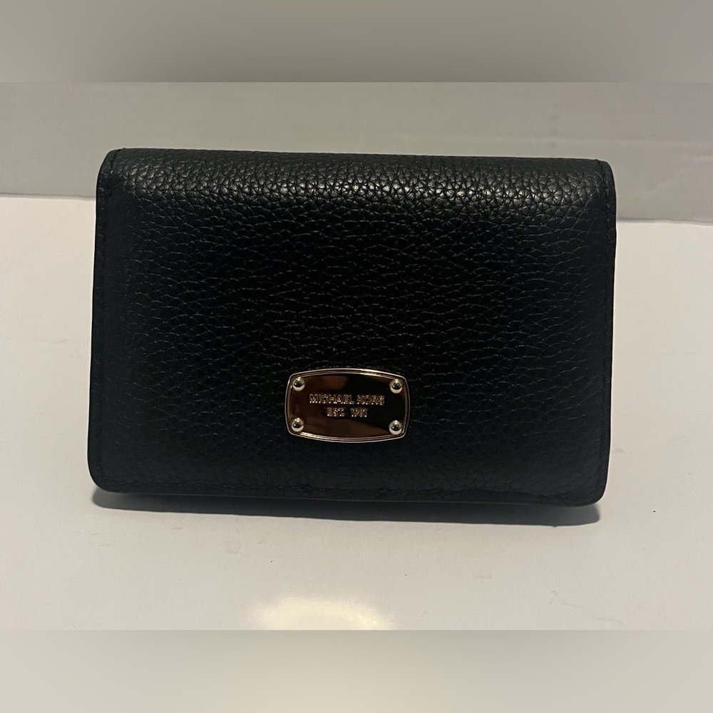 Michael Kors black pebbled leather bifold wallet with gold-toned hardware